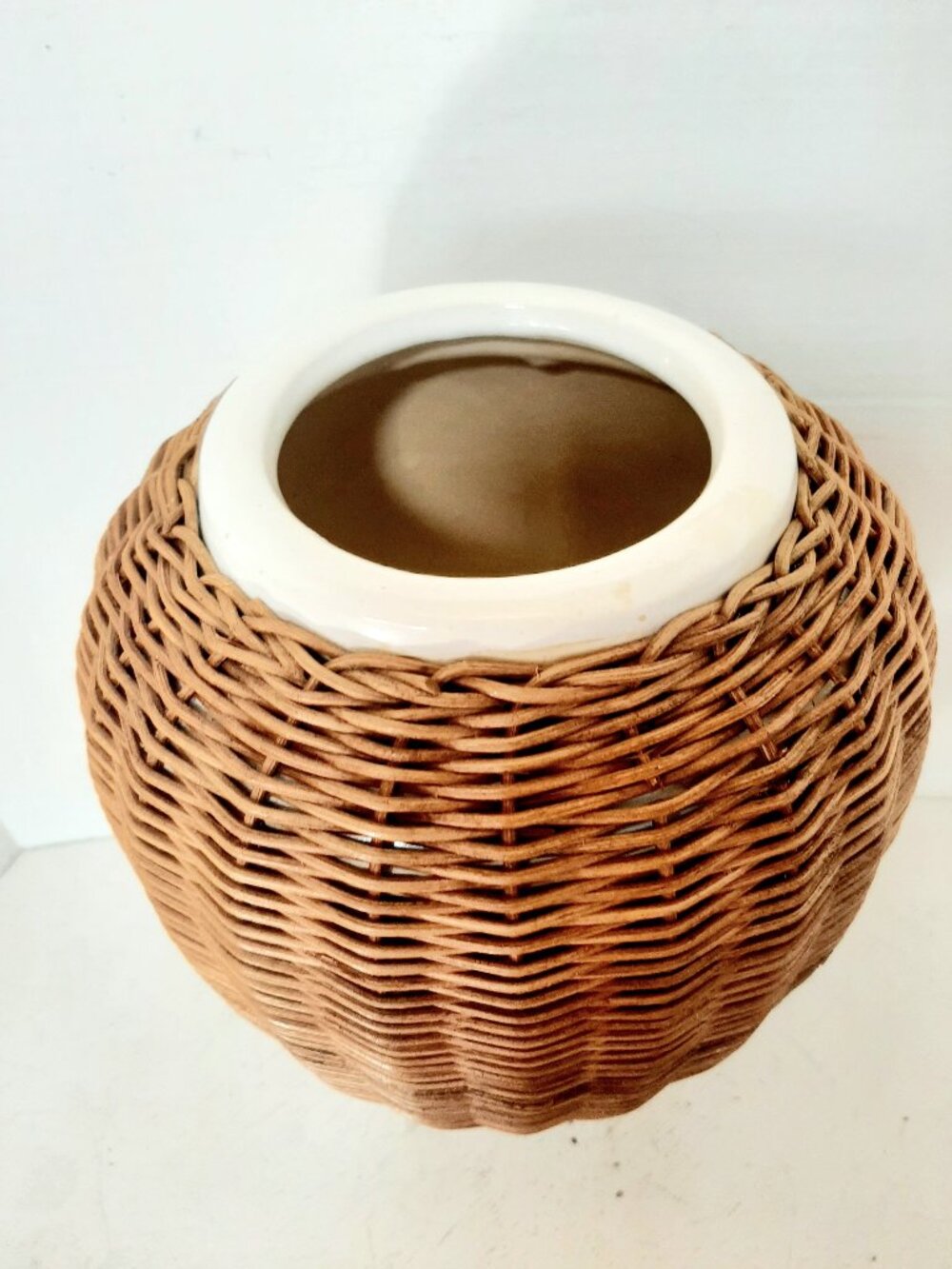 Large Stoneware pot wrapped in wicker. Great shape